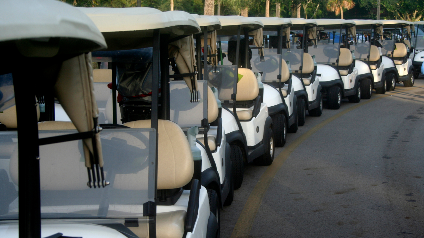 a line of golf carts for events